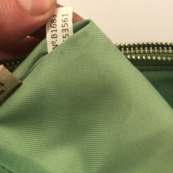 Coach double zipper green leather wristlet clutch